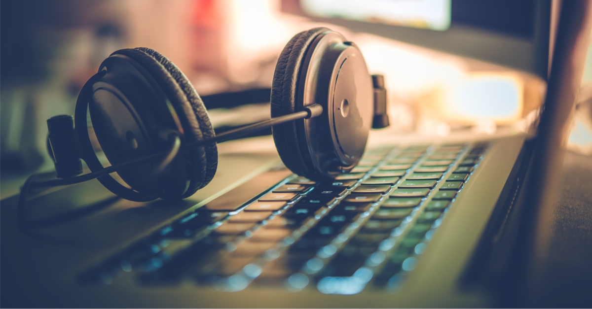 Headphones from a DJ laying on a studio computer